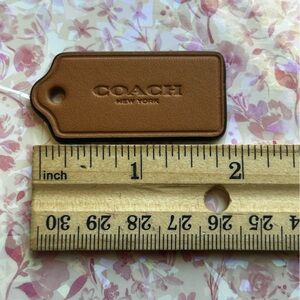 Coach Brown Leather Embossed Bag Tag